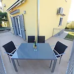 Tj 2 *